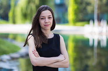 Picture of Kalina in front of pond in a park